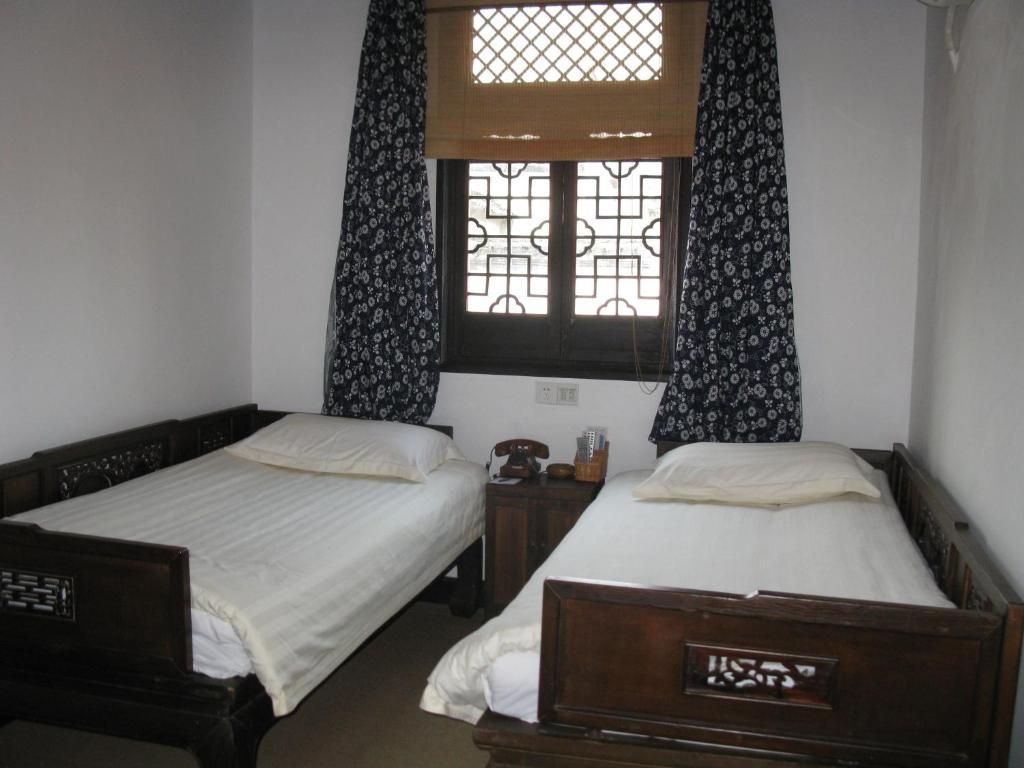 XI Di Travel Lodge Yi 部屋 写真
